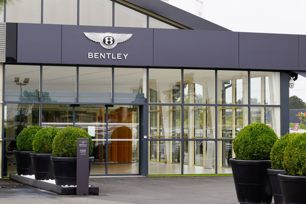 Bentley car dealership building with logo on the shop windows in Bordeaux, Aquitaine, France