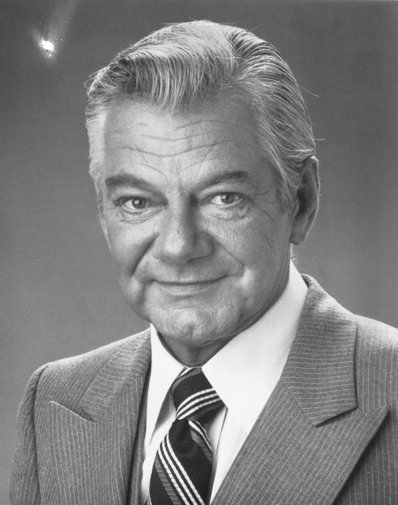 Bill Jorgensen headshot, seen wearing a suit and tie.