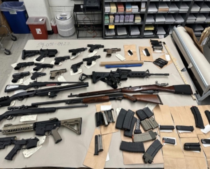 Police say they later found 20 firearms in his San Jose home, including an unregistered gun, high-capacity magazines, and assault rifles. 