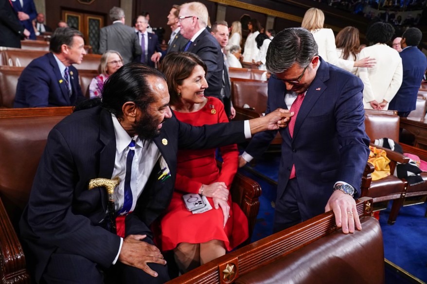 Speaker Mike Johnson chats with Cathy McMorris Rodgers and Al Green as they arrive at the U.S. Capitol before President Biden's State of the Union address.