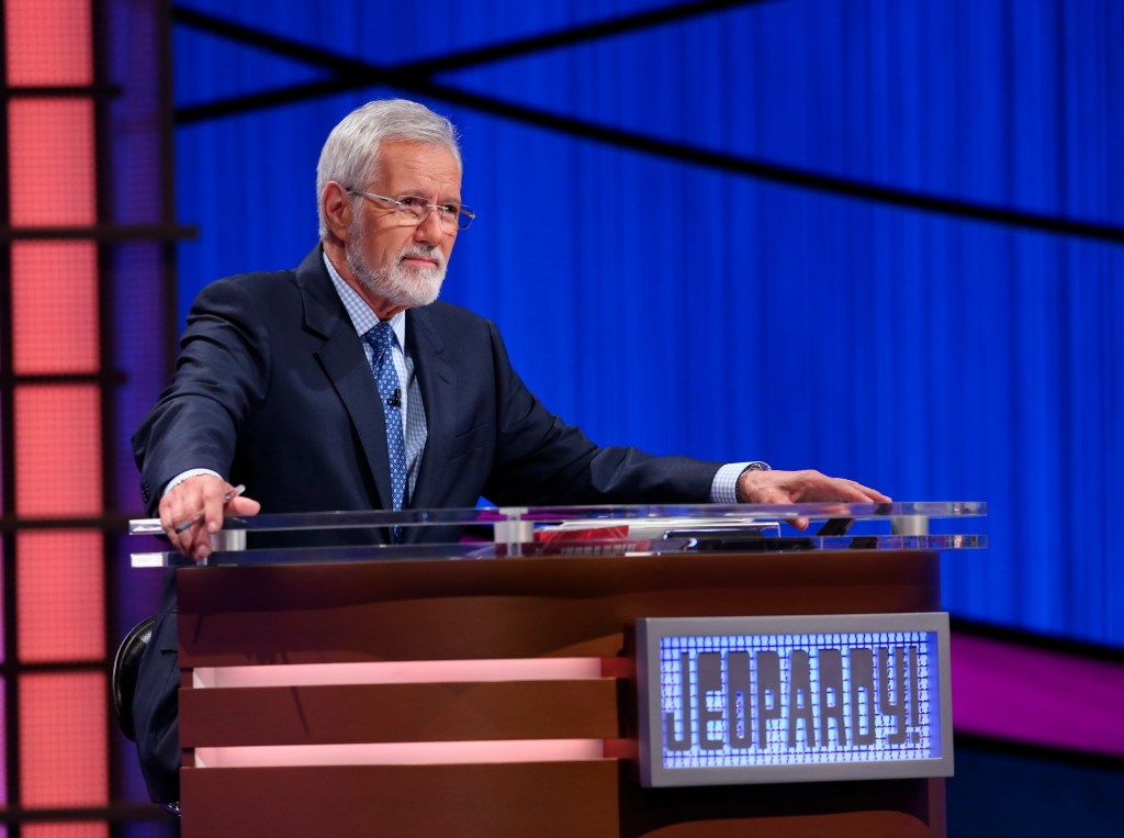 A bearded Alex Trebek hosting "Jeopardy!" in July 2018. He passed away in November 2020 at the age of 80.