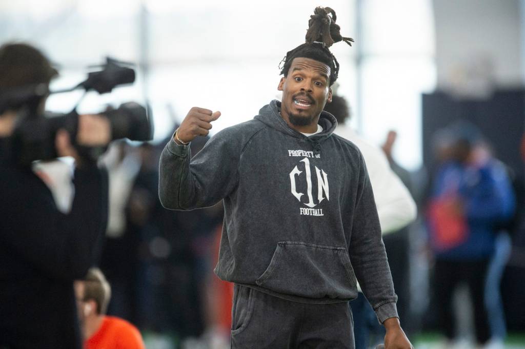 Cam Newton, former Auburn QB & NFL MVP, in grey sweatshirt with dreadlocks at Auburn Tigers Pro Day in Auburn, Ala. (USA TODAY)