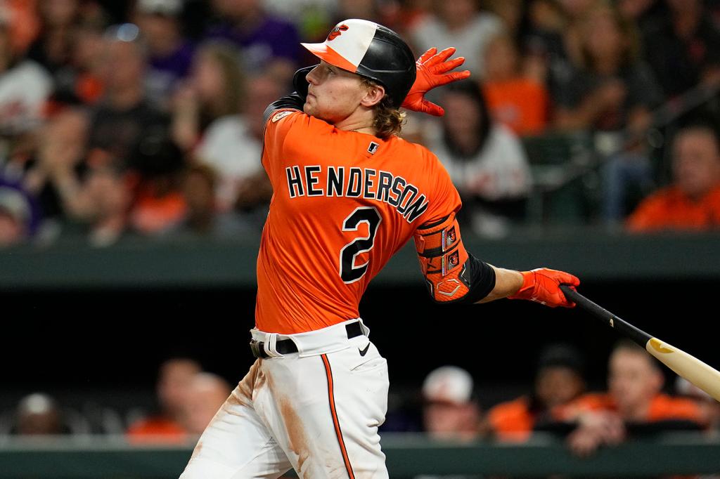 Baltimore Orioles' Gunnar Henderson follows through while hitting a two-run home run to score Adam Frazier in the second inning of a baseball game against the Tampa Bay Rays, Sept. 16, 2023, in Baltimore. 