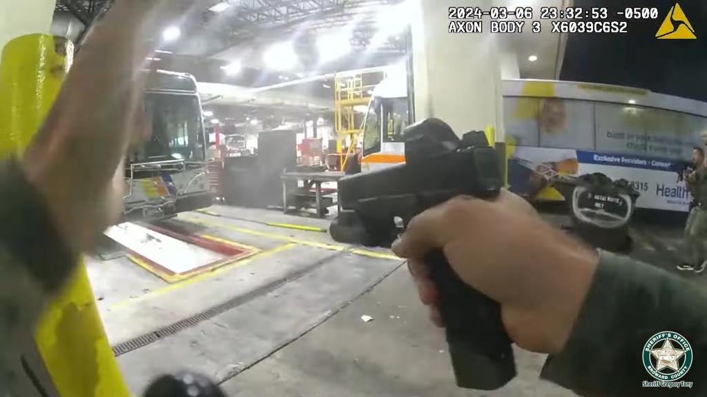 Deputies are seen in body camera footage shooting at a bus.