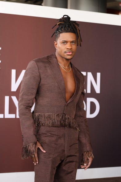 Jeremy Pope in brown suit attending ESSENCE Black Women In Hollywood Awards at Academy Museum of Motion Pictures in Los Angeles.