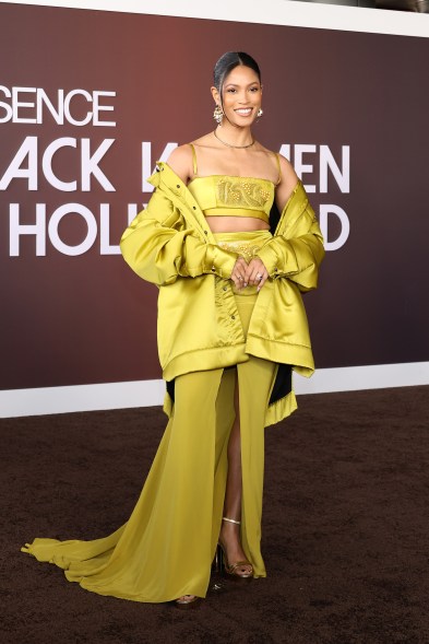 Lex Scott Davis in yellow dress attends ESSENCE Black Women In Hollywood Awards.