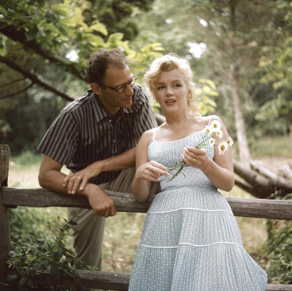 Posed shot of Marilyn Monroe and Arthur Miller at the estate. 