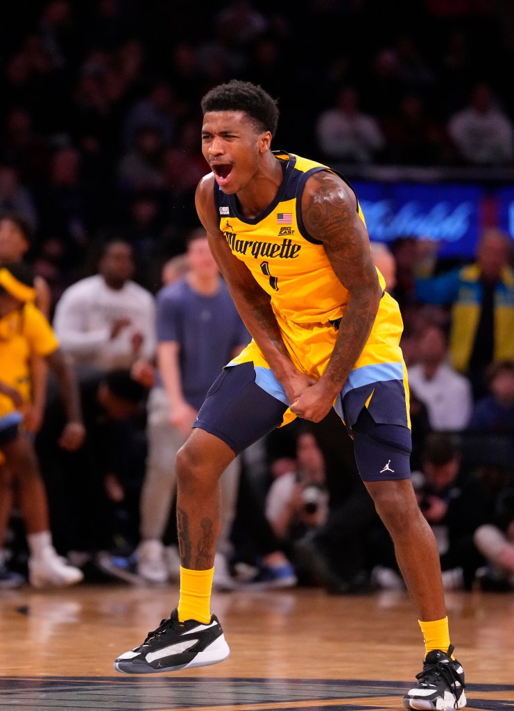 Marquette Golden Eagles guard Kam Jones (1) celebrates a score against Providence Friars during the first half at Madison Square Garden.