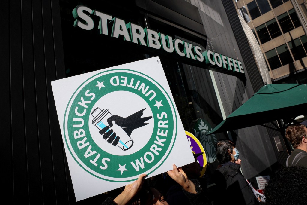 Members of the Starbucks Workers Union holding a rally and picketing outside Starbucks store in New York in a FILE PHOTO from November 16, 2023.