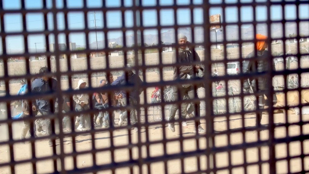 The migrants ran to another gate and begged the National Guard for help.