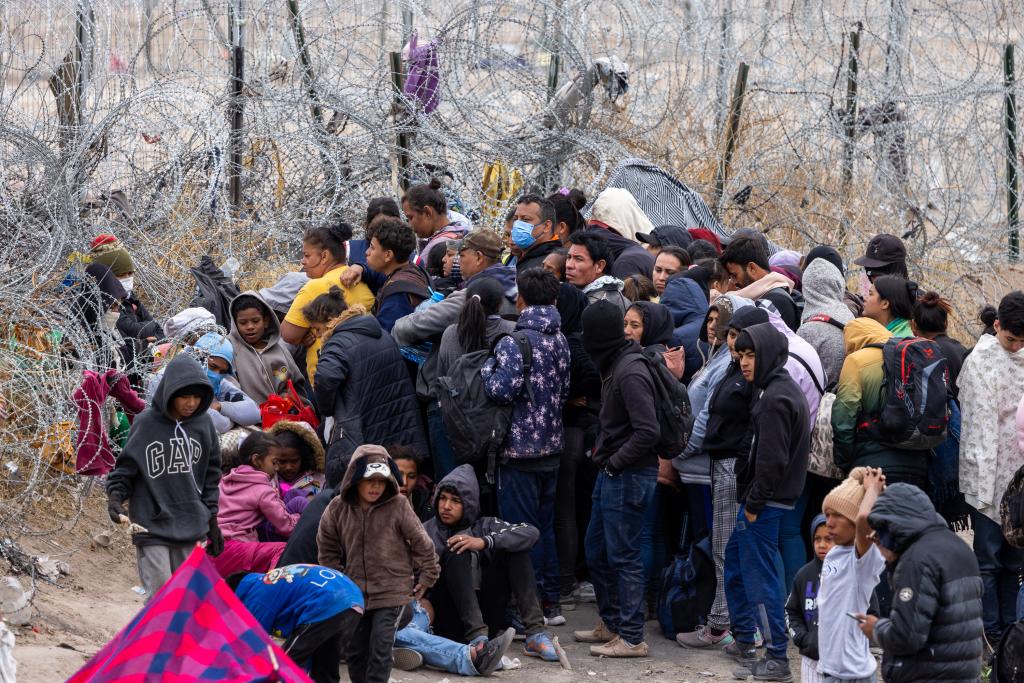 Migrants continued to cross the Rio Grande river into the United States on March 20.