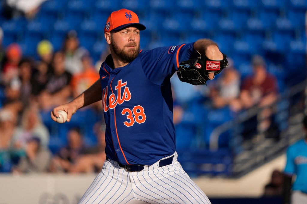 Mets starting pitcher Tylor Megill throws during the first inning of a spring training baseball game against the Miami Marlins.