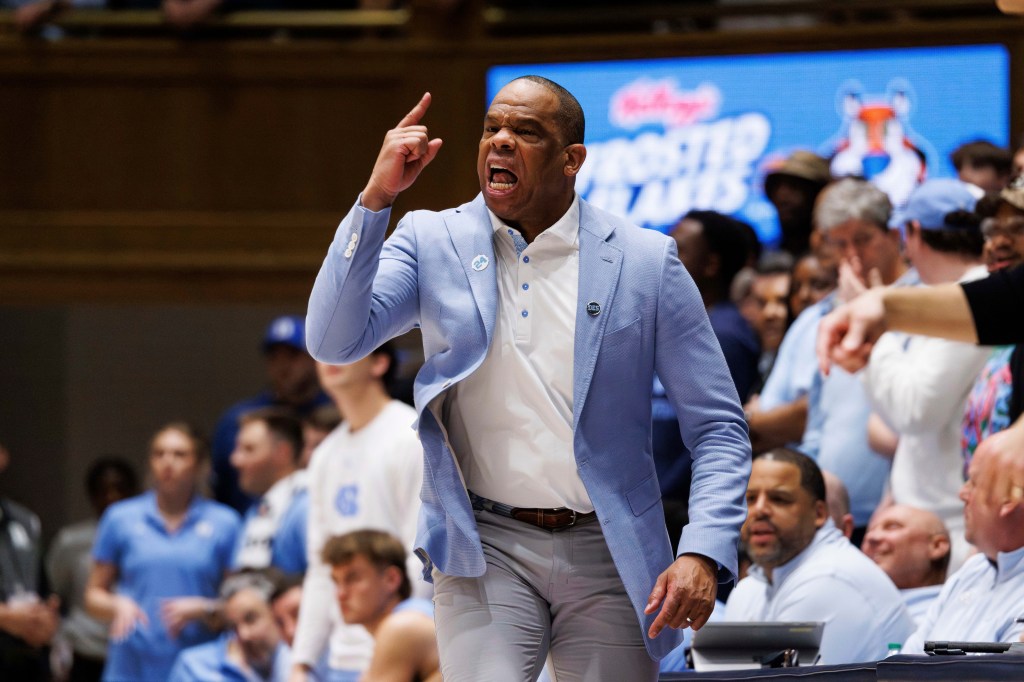 Carolina coach Hubert Davis shouts to players during the second half of the team's NCAA college basketball game against Duke.