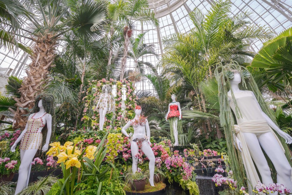 Dauphinette NYC's display at the NYC Botanical Gardens features beautiful flowers and fashion