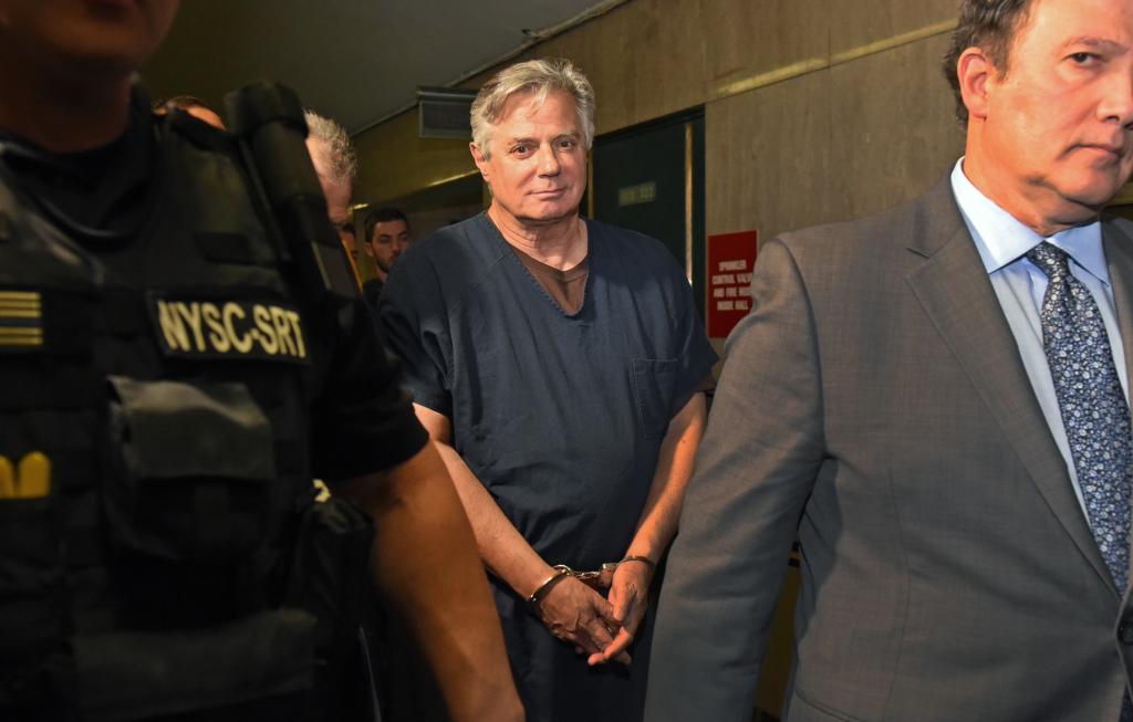 Paul Manafort handcuffed in New York State Supreme Court hallway. 100 Centre Street, NY, NY. Photo by Gregory P. Mango.