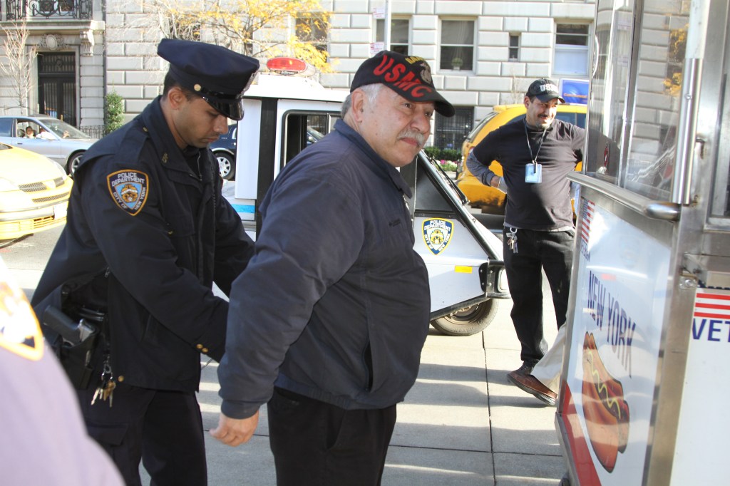 Rossi being arrested. 