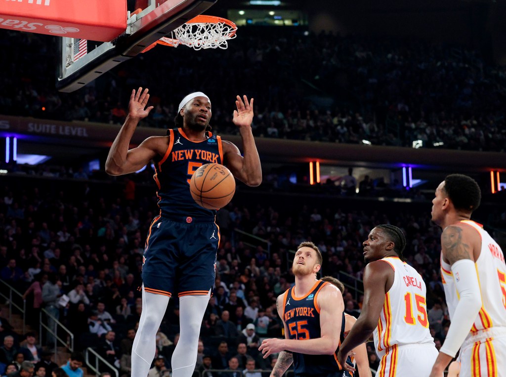 Precious Achiuwa #5 of the New York Knicks slams the ball during the first quarter.