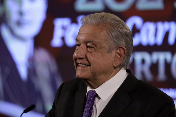 The president of Mexico, Andres Manuel Lopez Obrador shows a slingshot, that were used to cause damage to the National Palace in the attack by alleged Ayotzinapa students during the a briefing conference at the National Palace, in Mexico City.