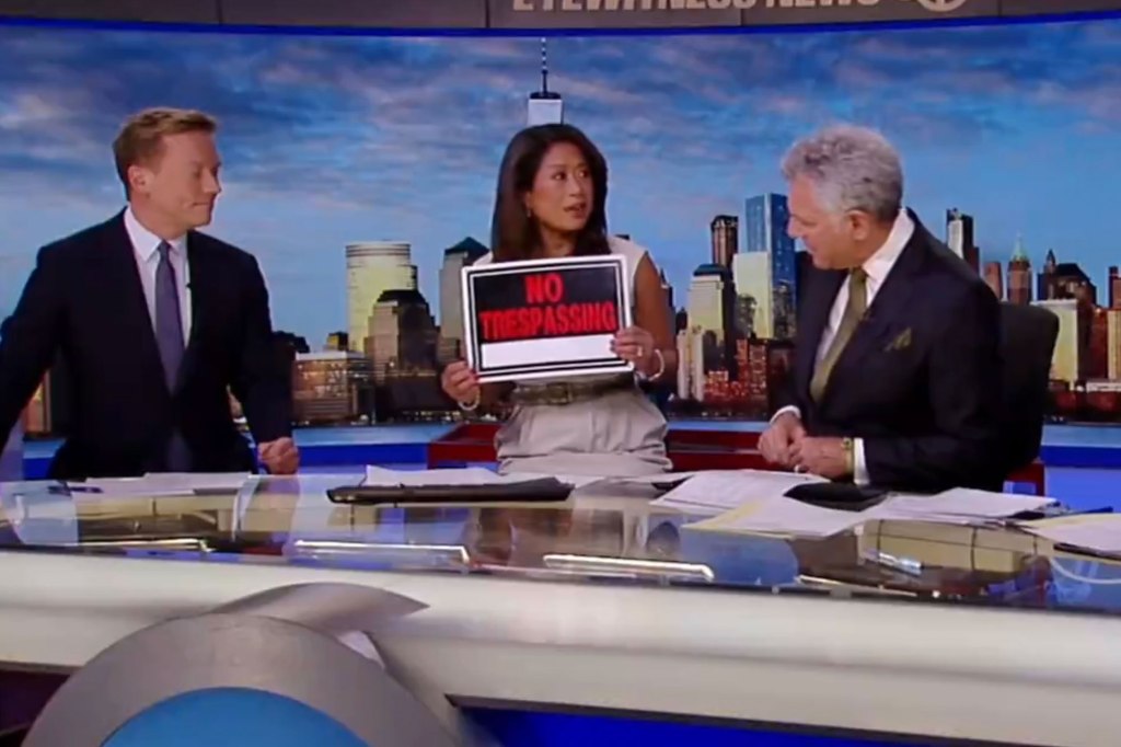 Nina Pineda holds up "No Trespassing" sign next to two other ABC 7 news anchors