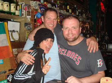 Lynch holding up a peace sign at Hibernia Bar with Mark Tafoya and Eddie McGhee