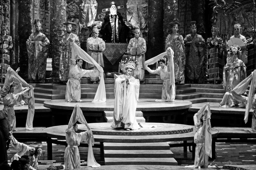 Swedish soprano Erika Sunnegardh performs as Turandot in the opera, accompanied by others on stage in the Metropolitan Opera House in New York.