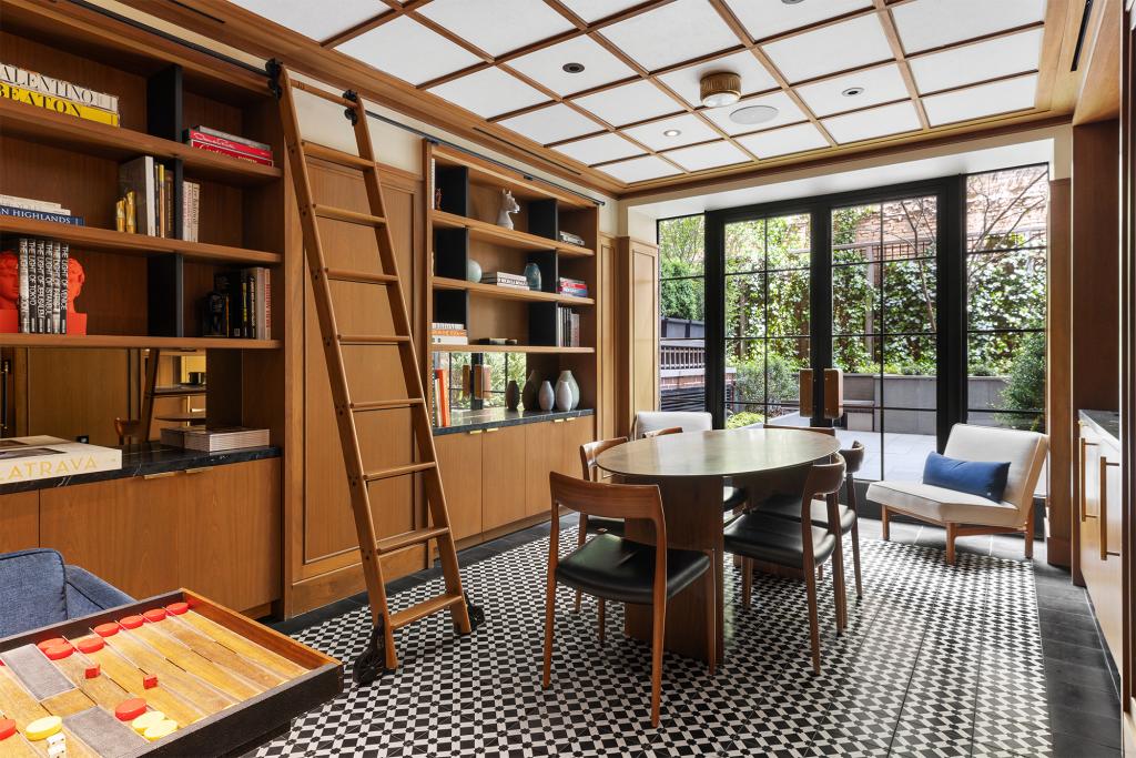 The Shephard's many amenities include a paneled library and game room. 