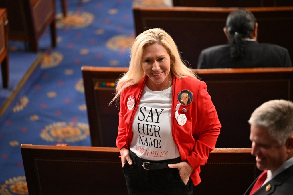 US Representative Marjorie Taylor-Greene (R-GA) wears a shirt and button showing slain Georgia college student Laken Riley ahead of US President Joe Biden's State of the Union address.