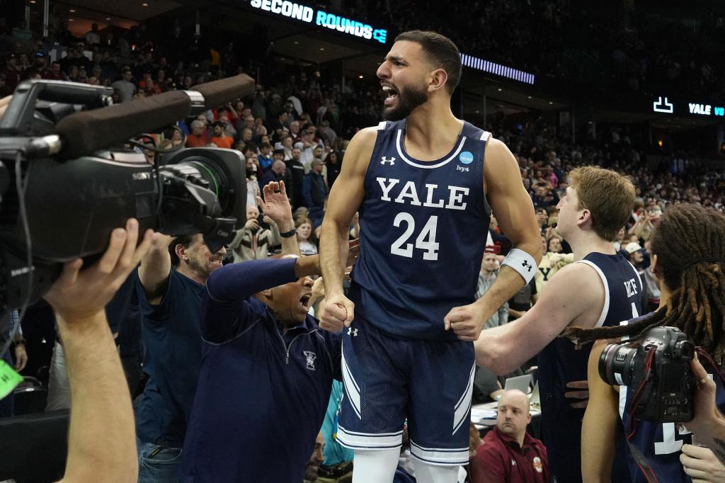 Yassine Gharram celebrates after Yale won the second NCAA Tournament game in program history.