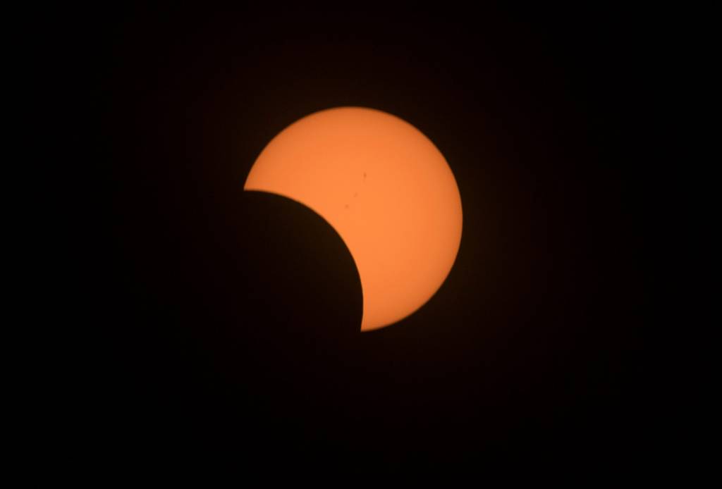 Partial solar eclipse in the sky around 11 a.m. in Stockton on Aug. 21, 2017