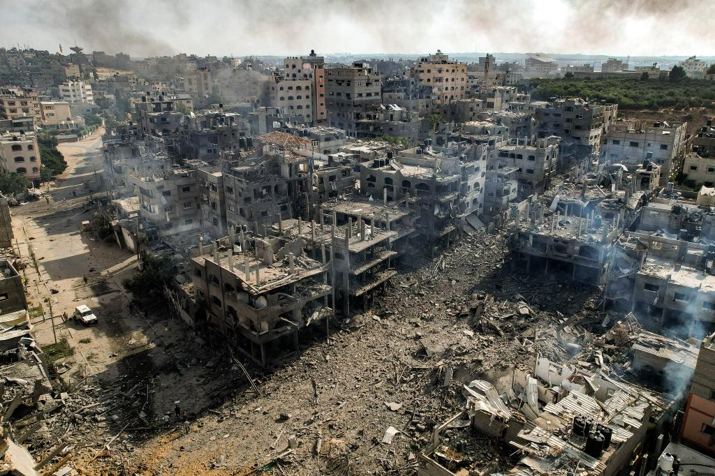 An aerial view of buildings destroyed by Israeli air strikes in the Jabalia camp for Palestinian refugees in Gaza City on Oct 11, 2023.