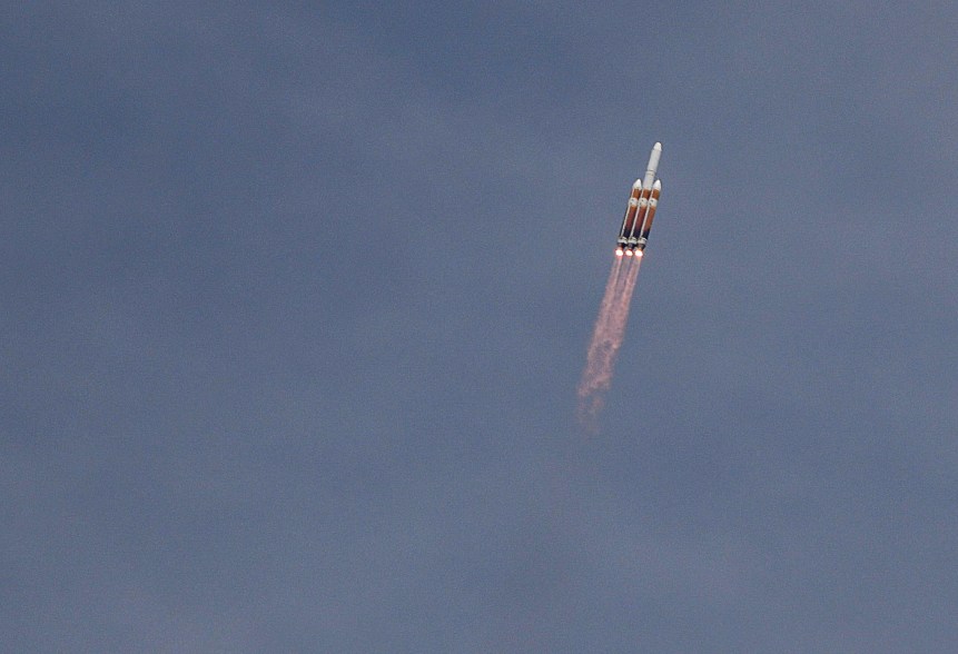 A United Launch Alliance Delta IV heavy rocket carrying classified spy satellite cargo for the U.S. National Reconnaissance Office lifts off from Space Launch Complex 37B at the Cape Canaveral Space Force Station, Tuesday, April 9, 2024, in Cape Canaveral, Fla.