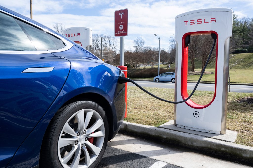 Tesla car being charged