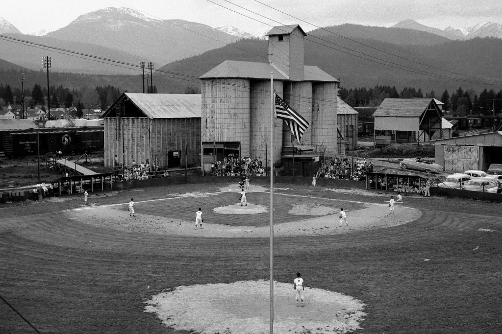 This photo from the 1960s shows a baseball field next to a railyard in Libby, Mont.