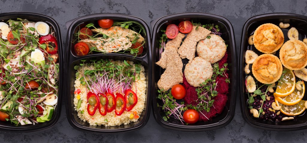 Right eating menu. Set of healthy meals in take out containers, panorama