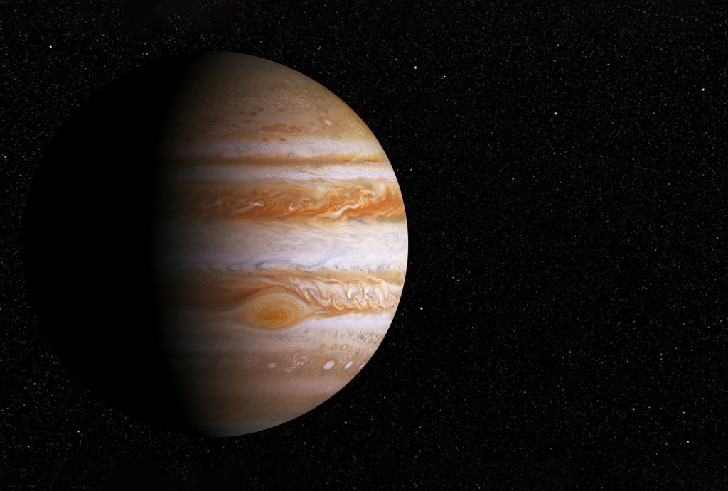 Planet Jupiter, with a big spot, on a dark background,copyspace. Elements of this image were furnished by NASA