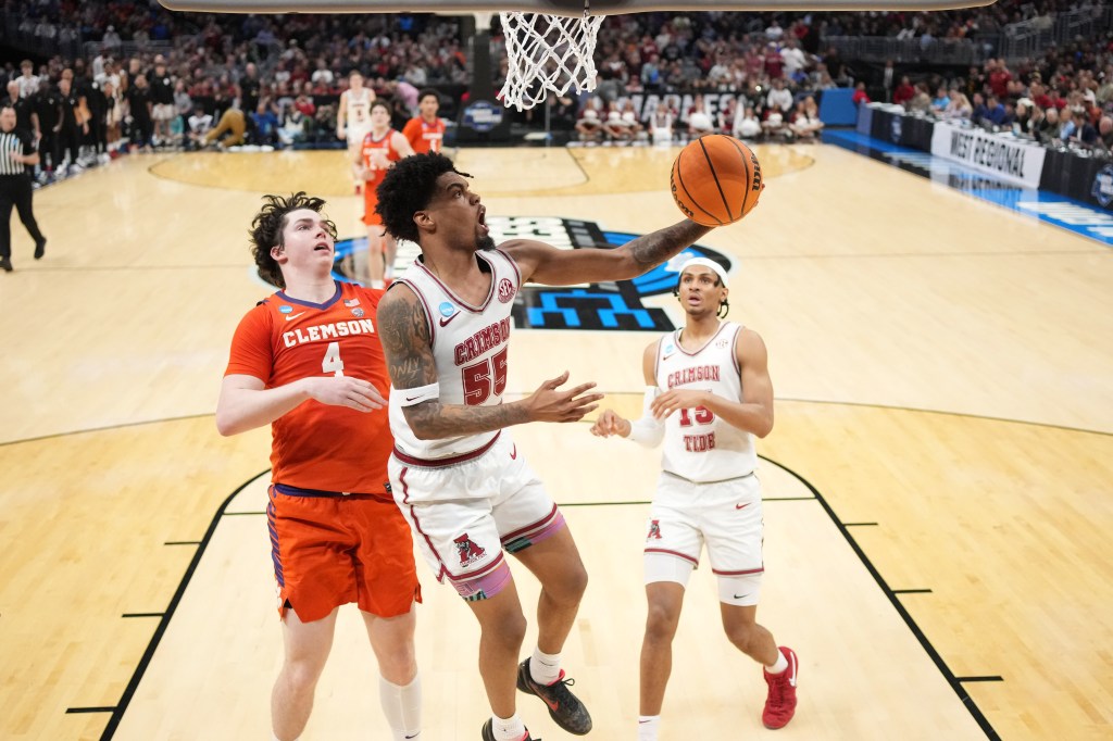 Alabama Crimson Tide guard Aaron Estrada (55) shoots against Clemson Tigers forward Ian Schieffelin