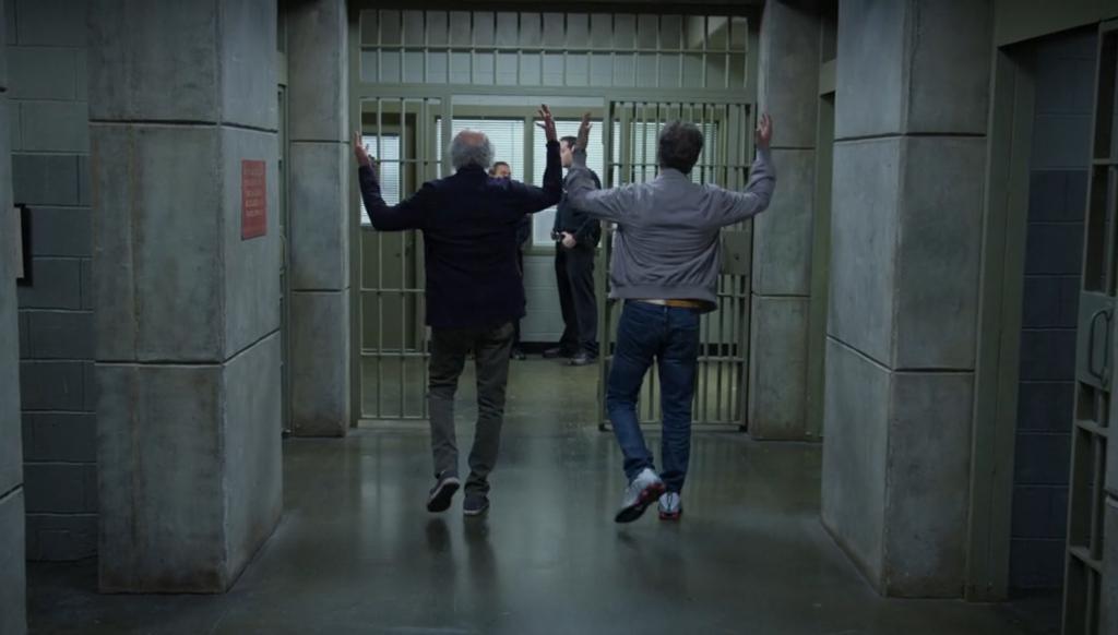 Larry David and Jerry Seinfeld leaving prison. 