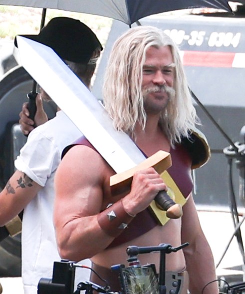 Chris Hemsworth in costume with a sword on his back on the set of a 'Clash Of Clans' commercial in Los Angeles.