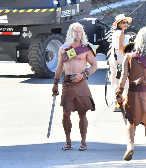 Chris Hemsworth in costume with a sword on his back on the set of a 'Clash Of Clans' commercial in Los Angeles.