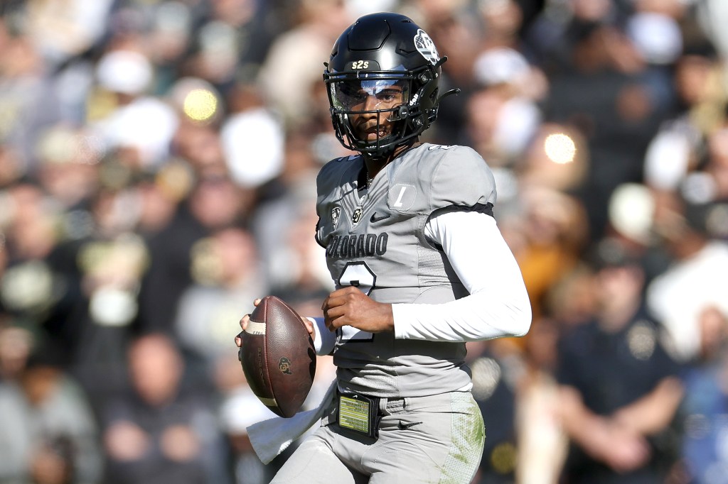 Quarterback Shedeur Sanders #2 of the Colorado Buffaloes runs out of the pocket against the Arizona Wildcats in the first quarter at Folsom Field on November 11, 2023 in Boulder, Colorado.