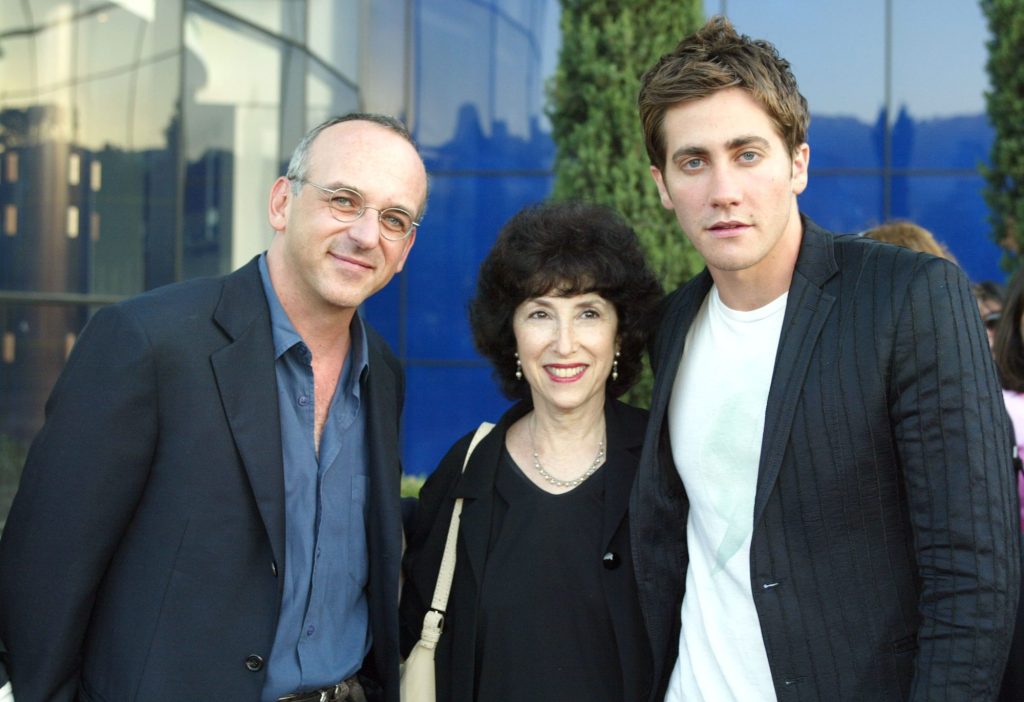 Executive producers Lucas Foster and Carol Baum alongside Jake Gyllenhaal at 'The Good Girl' premiere in West Hollywood, 2002