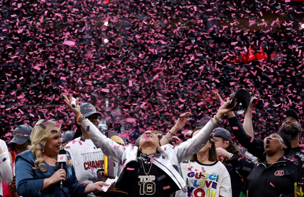 Head coach Dawn Staley of the South Carolina Gamecocks celebrates after beating the Iowa Hawkeyes in the 2024 NCAA Women's Basketball Tournament National Championship at Rocket Mortgage FieldHouse on April 07, 2024 in Cleveland, Ohio.  