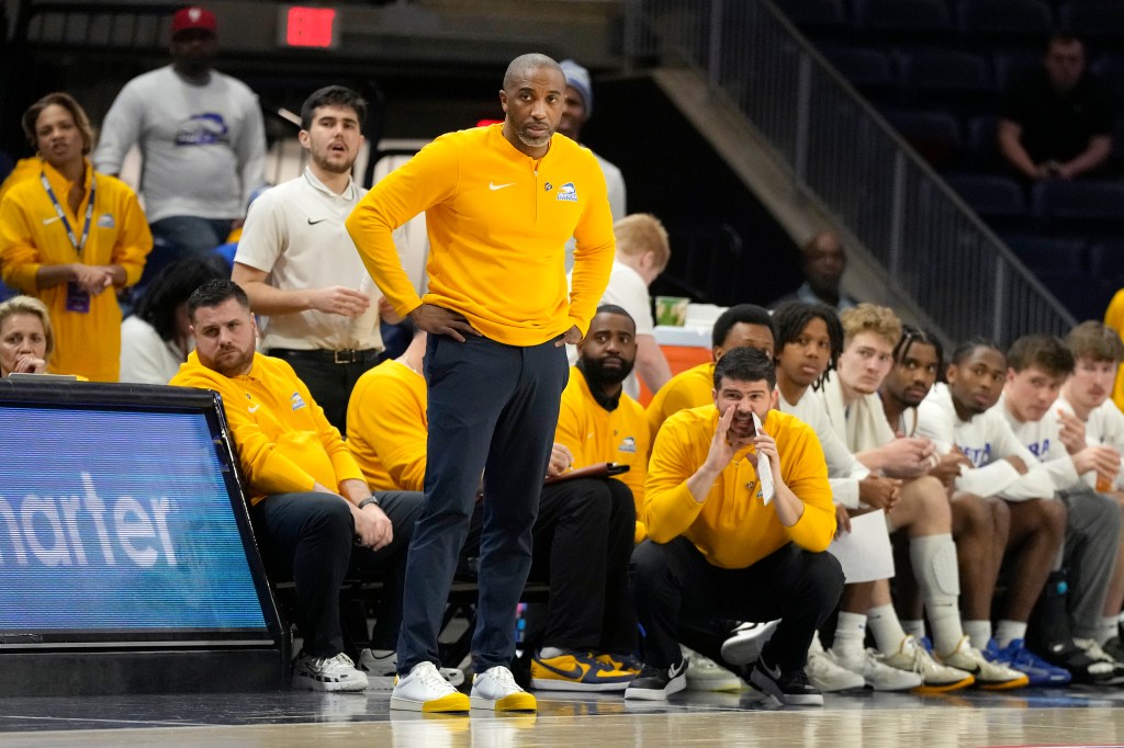 Head coach Speedy Claxton of the Hofstra Pride looks on in the second half during the semifinal round of the CAA Mens Basketball Tournament against the Hofstra Pride