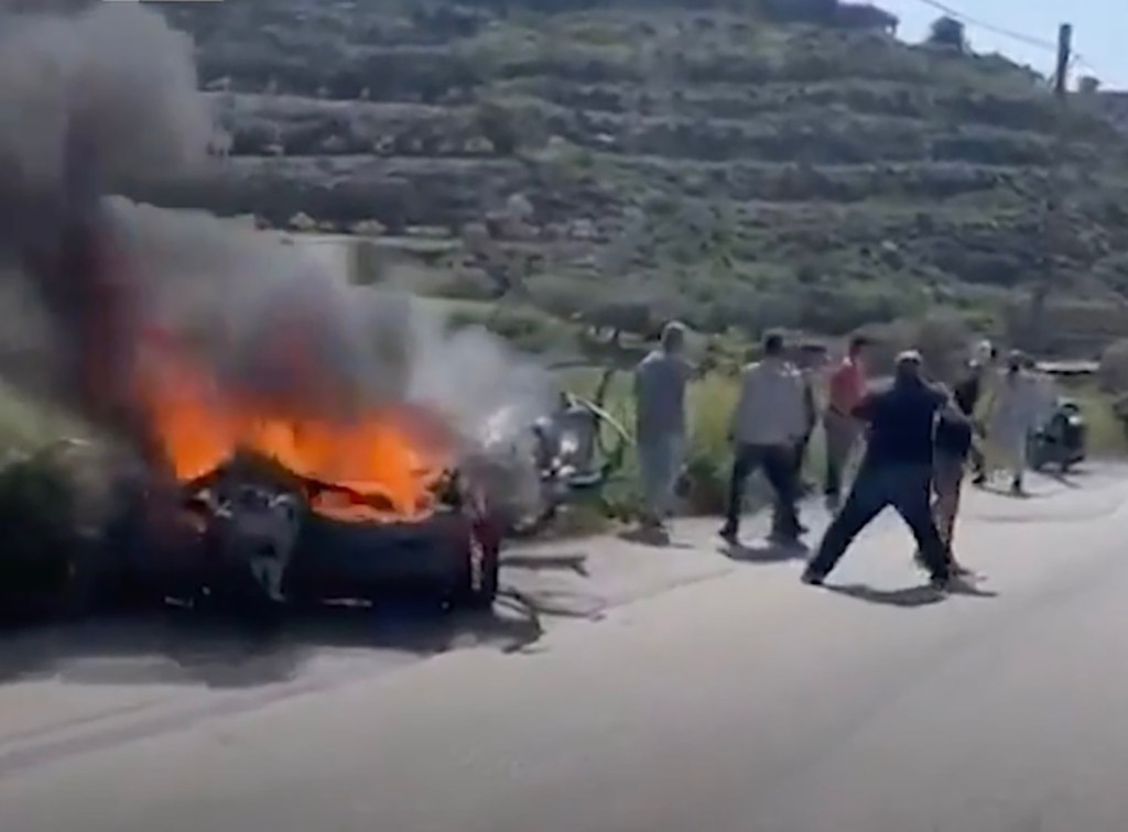 Hezbollah commander's car seen engulfed in flames 