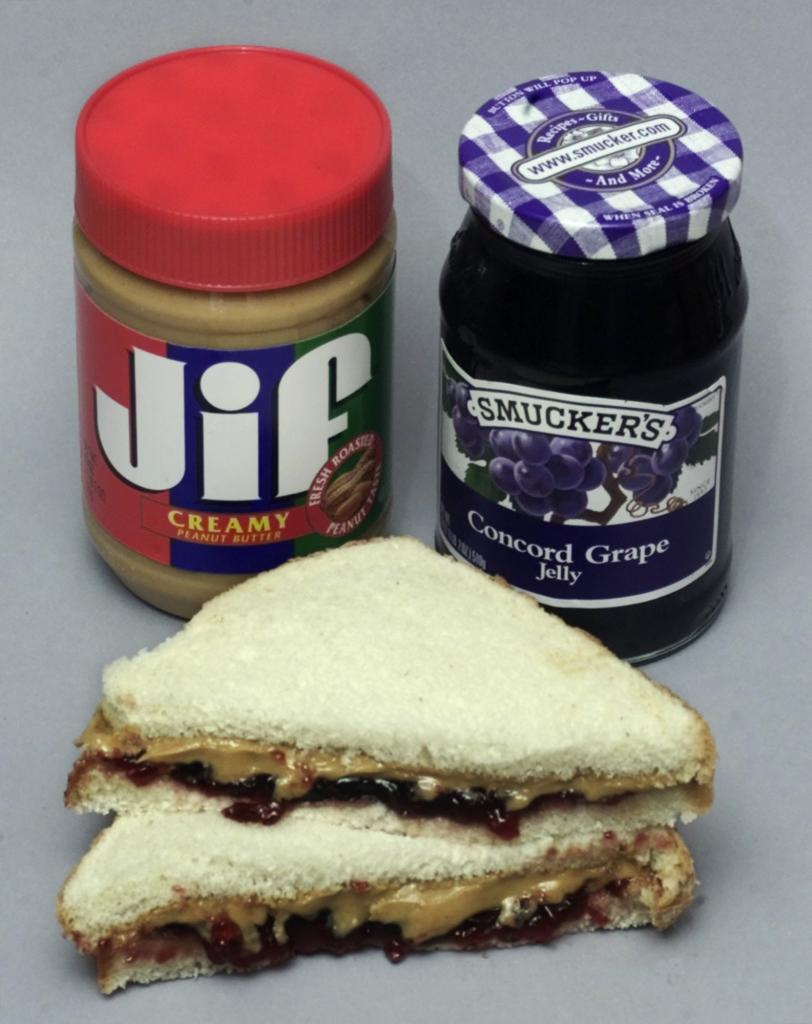 A sandwich and a jar of Jif peanut butter, representing its increased demand as a protein alternative to meat