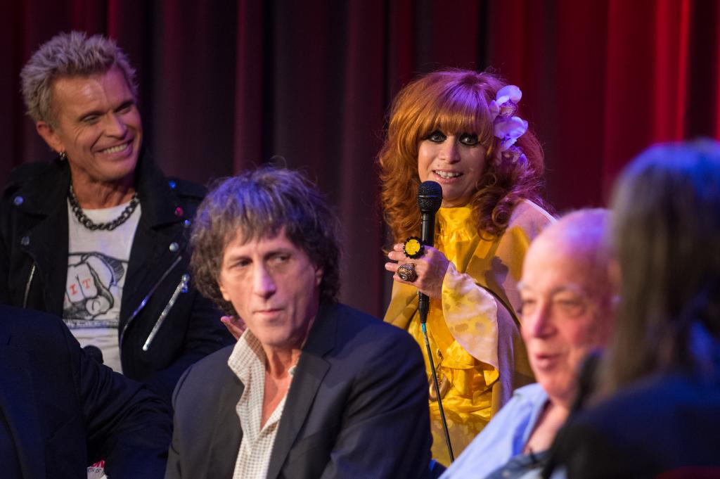 Linda Ramone, Mickey Leigh, and Shepard Fairey speak onstage at 'Hey! Ho! Let's Go: Celebrating 40 Years Of The Ramones' at The Grammy Museum in 2016. 