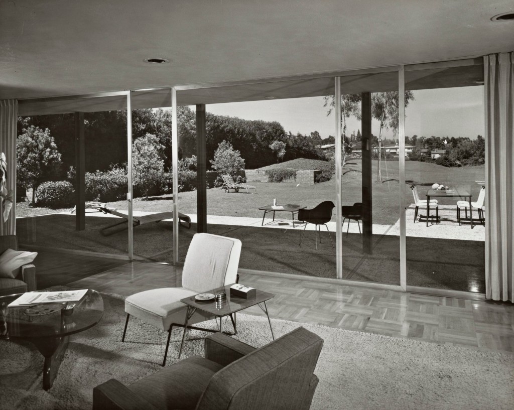 The home was built in the 1950's with floor-to-ceiling walls of windows. 