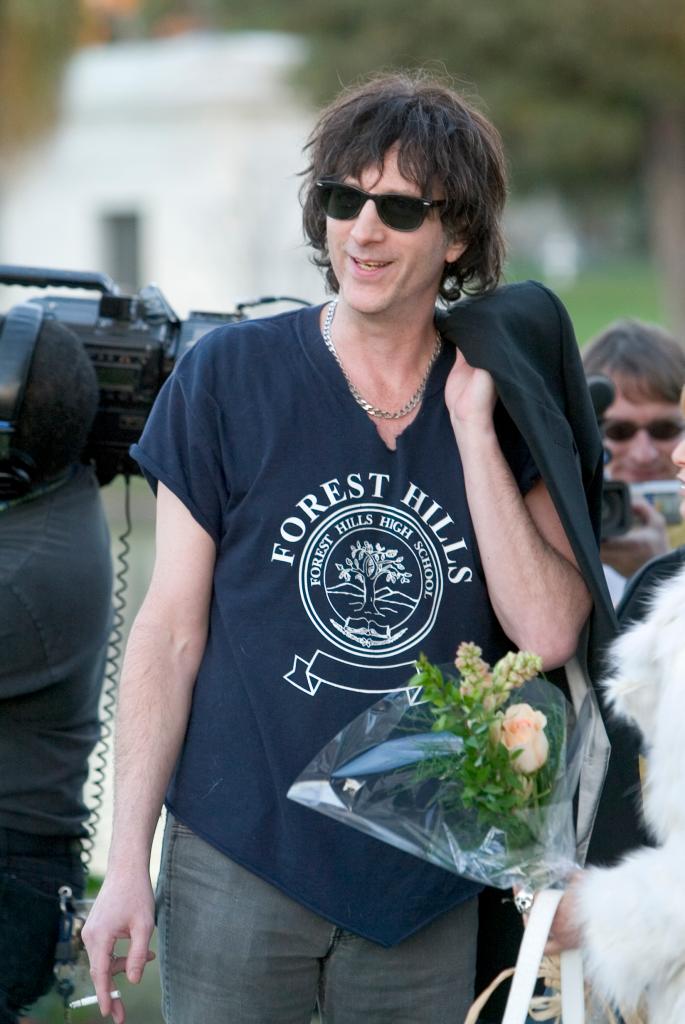 Hyman at the memorial ceremony for punk rocker Johnny Ramone, who was immortalized with a bronze statue in the Hollywood Forever Cemetary in 2004.