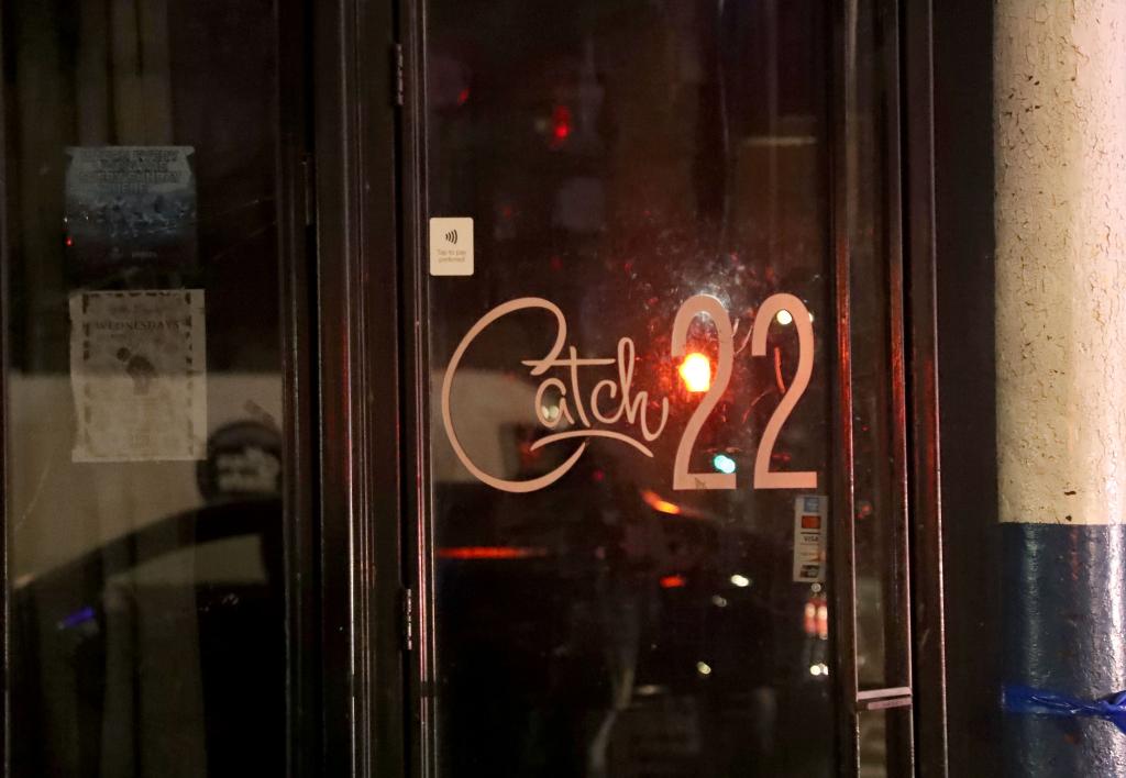 The business logo on a window. 