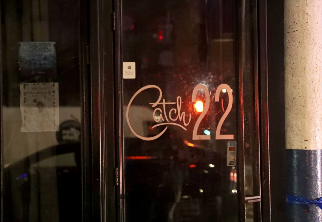 The business logo on a window. 